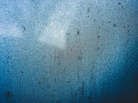 A frozen window pane.