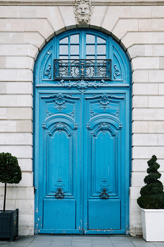 Large blue door in an old building