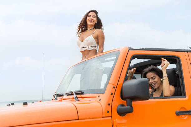 istock Two attractive young women laughing and having fun 1371998795