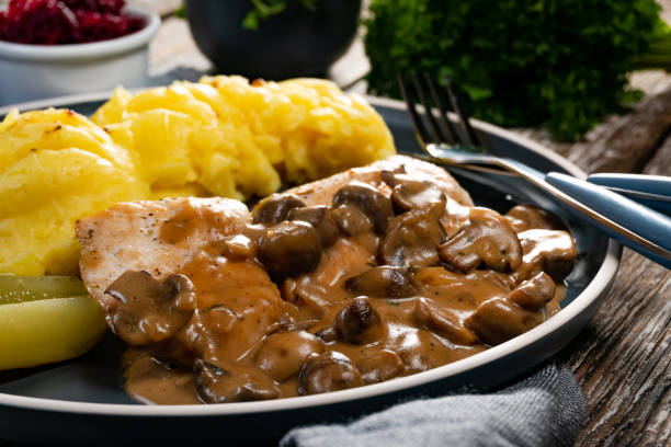 istock Grilled chicken breast with mushroom sauce. 1372000304