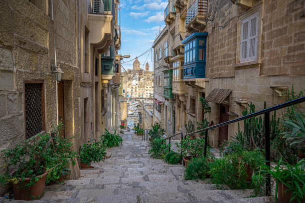 Narrow street with stairs in Valletta, Malta stock photo