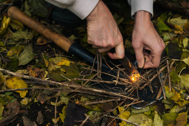 close-up-cropped-shot-of-scout-male-lighting-fire-starting-campfire-with-fire-starting-tools.jpg?s=612x612&w=0&k=20&c=7zEjQLGyVRi6abl4t3miiT_DFRGEFl381R_FhD5rhoQ=