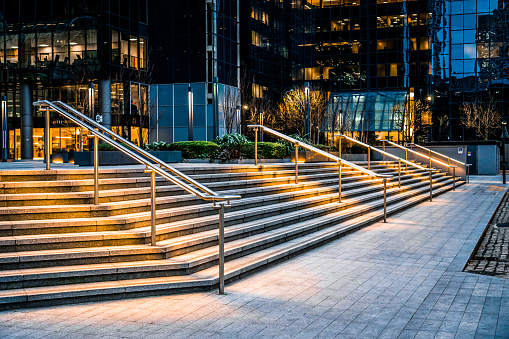 Stairs of Futuristic Building Illuminated at Night