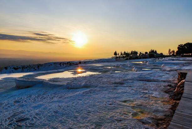 Pamukkale, Turkey.  Sunset in the natural travertine pools.