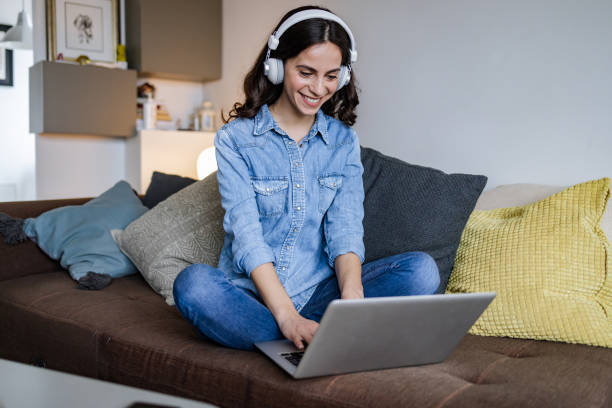 istock Smiling female working at home. 1372005811