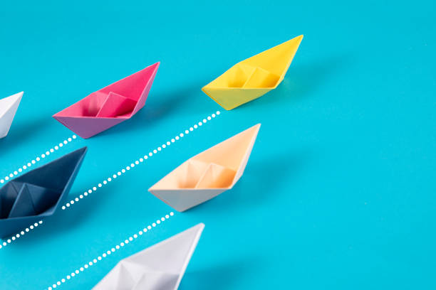 istock Leadership Concept with Paper Boats 1372007921