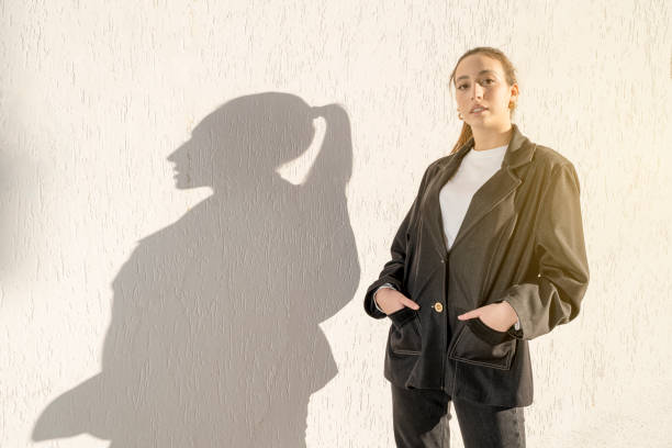istock Confident young caucasian mediterranean woman with shadow 1372008950