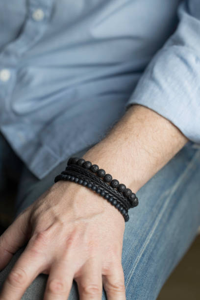 istock man with a stylish bracelet on his wrist 1372009989