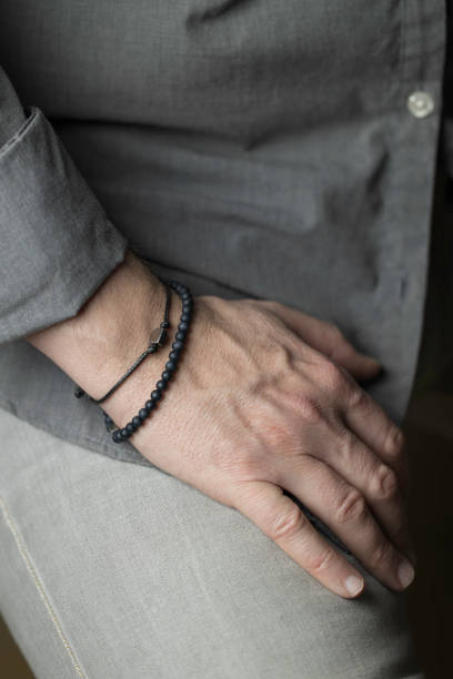 istock man with a stylish bracelet on his wrist 1372009992