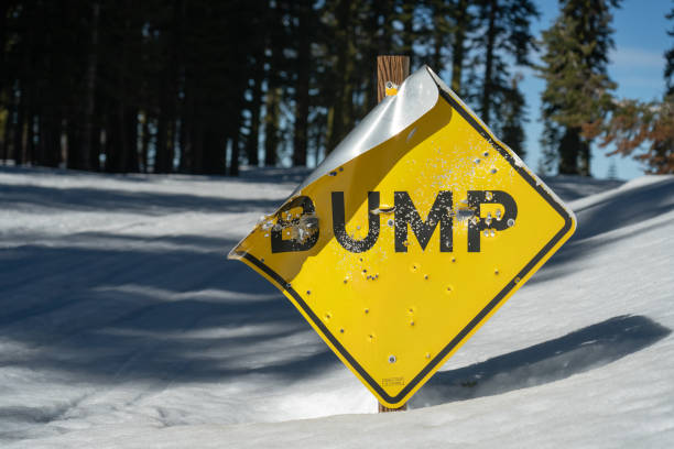 Road sign warning of falling rocks