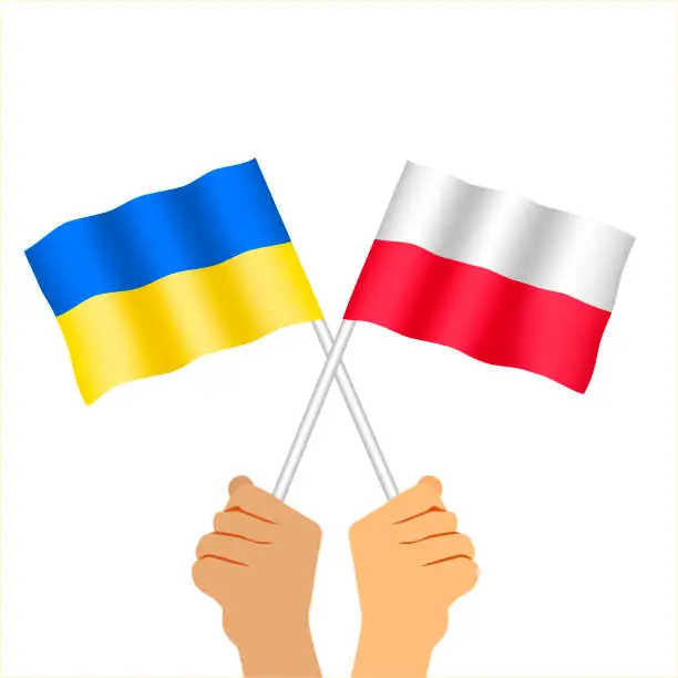 Vector illustration of Hands holding Polish  flag and ukrainian flag. Two waving state flags of Poland and Ukraine. Flat vector illustration isolated on white background.