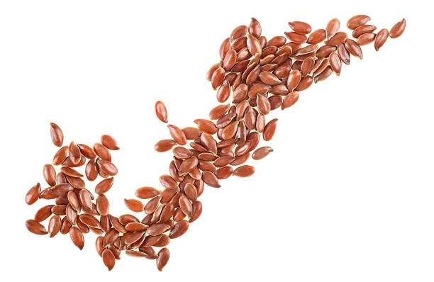 istock Brown flax seeds isolated on a white background, top view. 1372011370