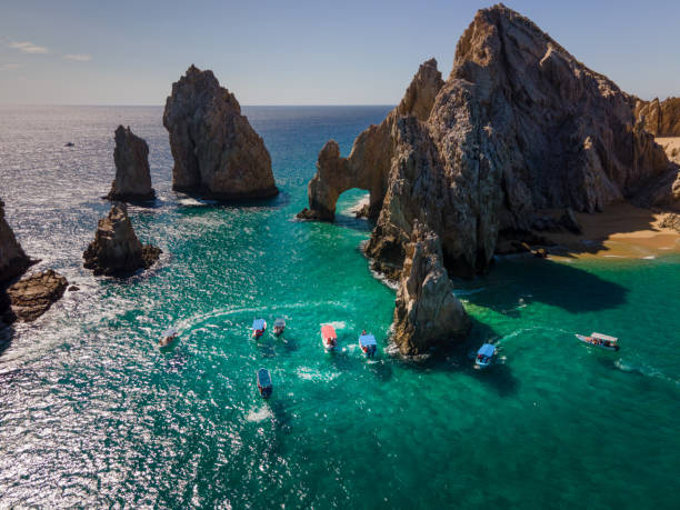 Aerial view looking down at the famous Arch of Cabo San Lucas, Baja California Sur, Mexico Darwin Arch glass-bottom boats viewing sea life stock photo