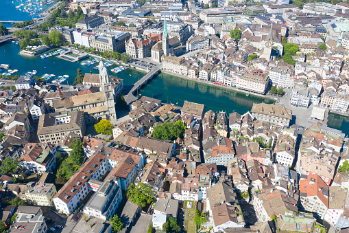 Aerial view of Limmat river and famous Zurich churches. Zurich is important financial center of Switzerland and lovely historical city.