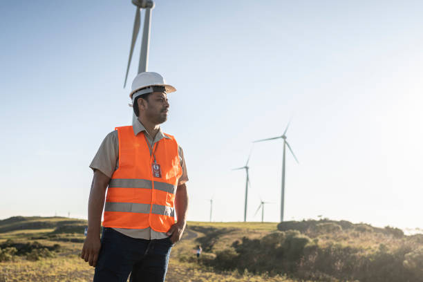 istock Portraits of an electrical engineer / technician in a wind farm park 1372014242