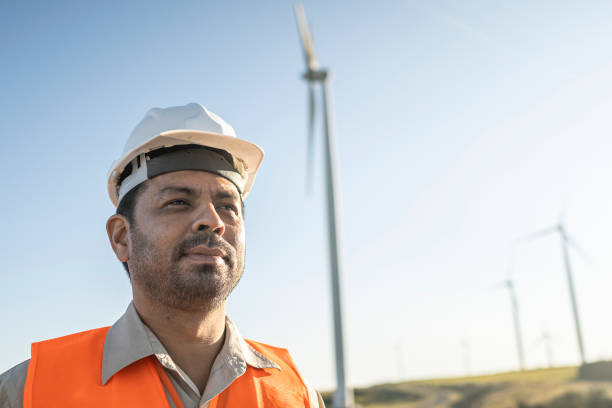 istock Portraits of an electrical engineer / technician in a wind farm park 1372014267