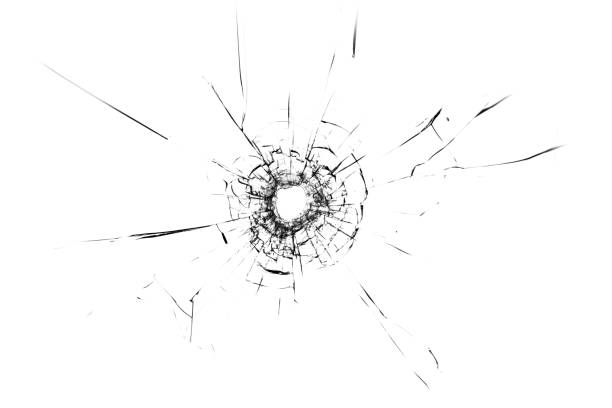 istock The texture of broken glass. Bullet hole 1372017835