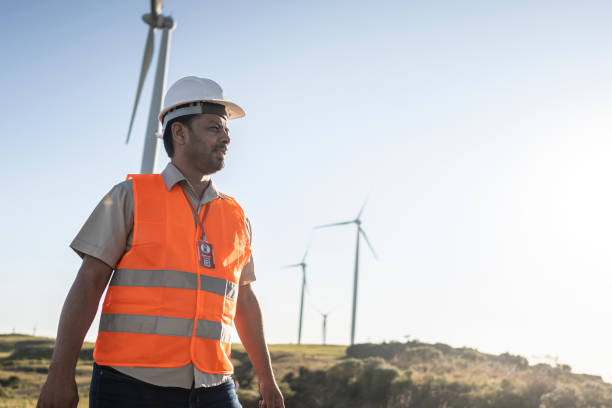 istock Portraits of an electrical engineer / technician in a wind farm park 1372017921