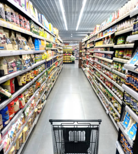 istock empty grocery cart in an empty supermarket 1372021640