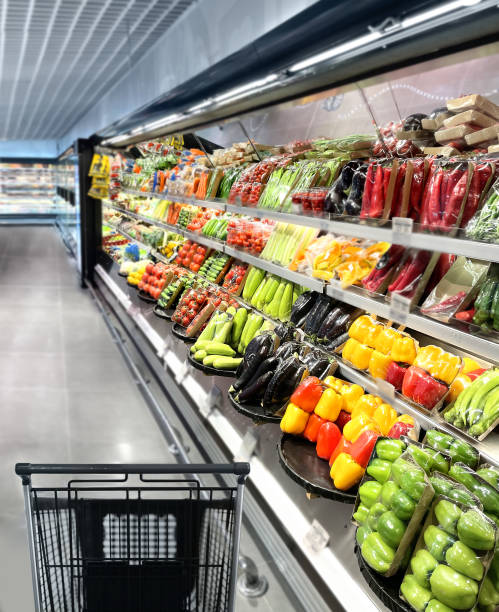 istock empty grocery cart in an empty supermarket 1372021642