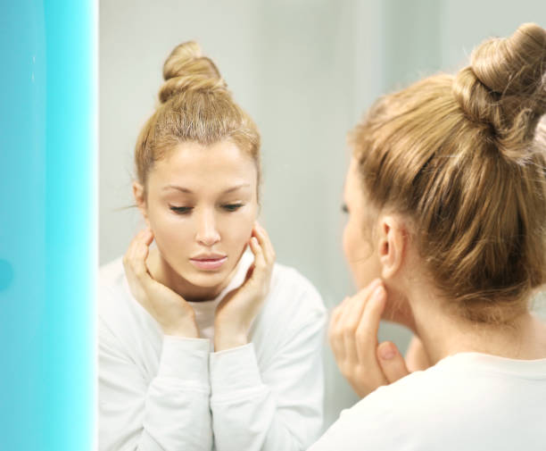 istock Applying the cream.Magic anti-aging cream. 1372021777