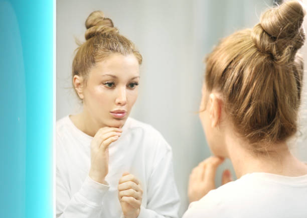 istock Applying the cream.Magic anti-aging cream. 1372021778