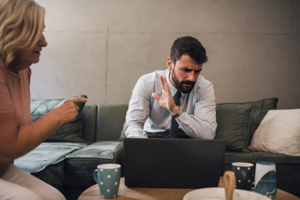 istock Mother and son are arguing over his financial independence 1372028029