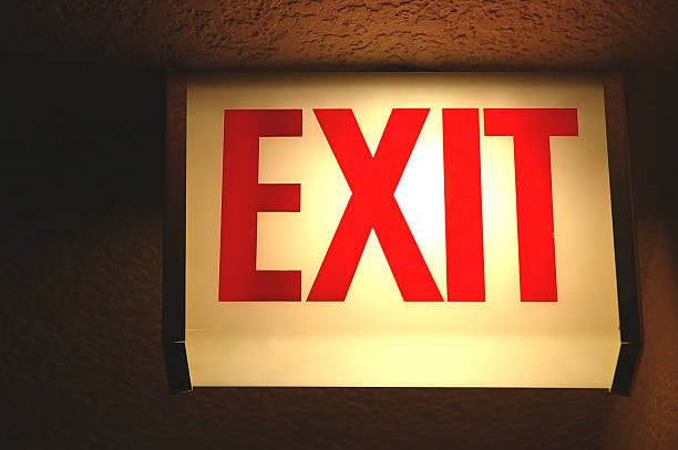Color:red Exit Sign 50+ Red Exit Signs In Dark Hallway Stock Photos, Pictures & Royalty ...