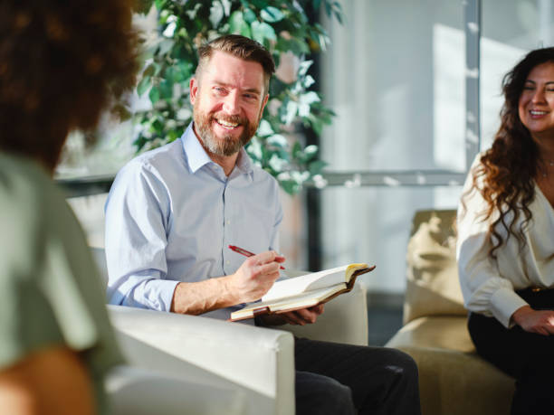istock Business People in a Hotel Lobby 1372036369