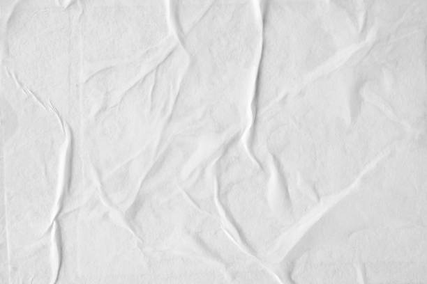 istock white crumpled and creased paper poster texture background 1372047397