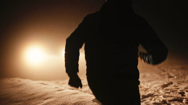 istock Man with car issues on winter road. 1372047615