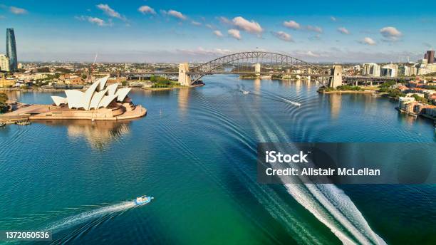 Boat Wakes In Sydney Harbour With Opera House And Bridge In Background Stock Photo - Download Image Now