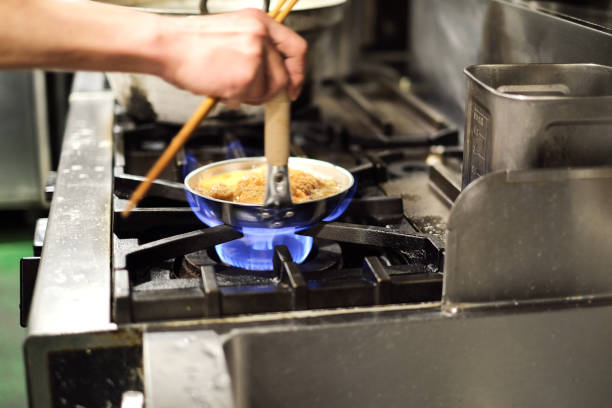 Cooking in the kitchen of food shop