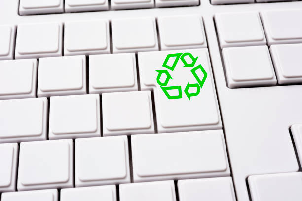 istock Close-up of blank computer keyboard and enter key with recycling symbol 1372053250
