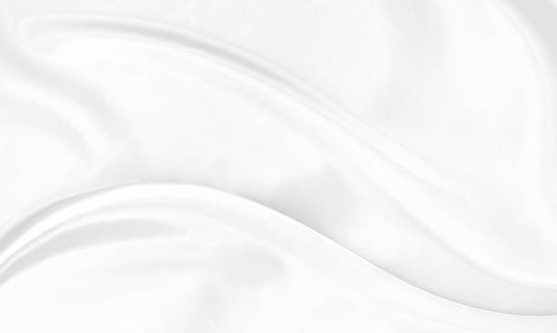 istock White gray satin texture that is white silver fabric silk background with beautiful soft blur pattern natural. 1372053982