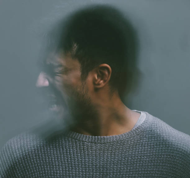 istock Studio shot of a young man experiencing mental anguish and screaming 1372054870