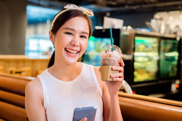 istock woman shopping in mall 1372058065