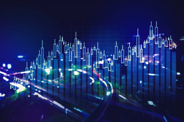 istock Candlesticks graph with night city background 1372058115