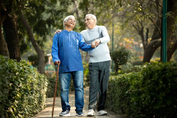 istock Two senior men having fun at park 1372061590