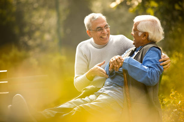 istock Two senior men having fun at park 1372061627