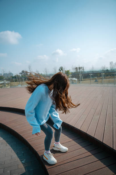 istock A beautiful asian girl dancing happily 1372064033