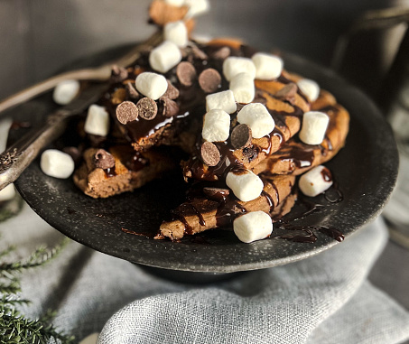 Chocolate pancakes made topped with chocolate syrup and marshmallows! Under five ingredients and ready in just minutes! (Gluten Free, Dairy Free, Vegan, Vegetarian, Soy Free, Nut Free, Egg Free)