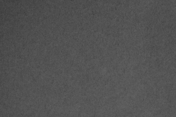 istock Black grey cardboard sheet texture background, pattern of kraft paper with vintage style. 1372068027
