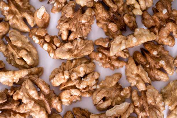 Walnuts background. Kernels walnuts. Top view. Vegetarian or healthy eating. Vegetarian or healthy eating.