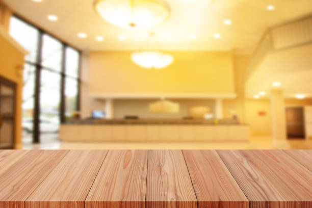 istock Perspective empty wooden table on top over blur background, can be used mock up for montage products display or design layout. 1372072149