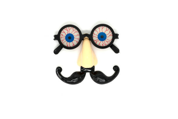 istock Funny extravagant party goggles on a white background. 1372075779