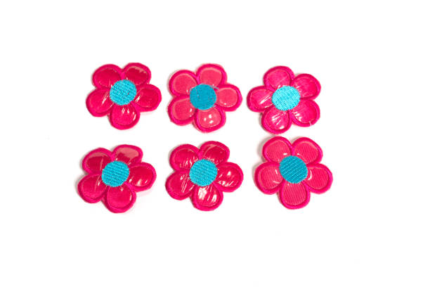 istock Six artificial red flower isolated on white background. 1372075871