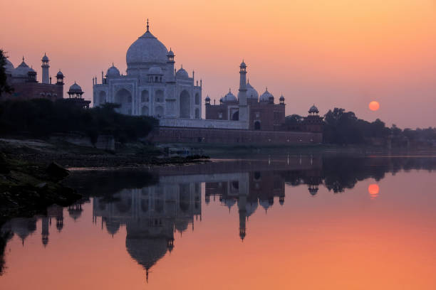 istock Taj Mahal reflected in Yamuna river at sunset in Agra, India 1372077072