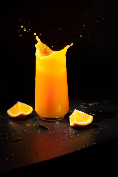 istock Drink with orange juice on a dark background 1372077330