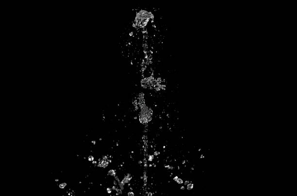 istock water splash, waterfall isolated on the black background 1372078292